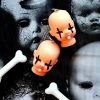 Tentacle Vomit Beheaded Baby Doll Head Earrings